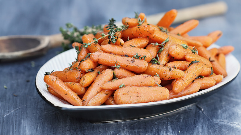 photo of glazed carrots on a white plate