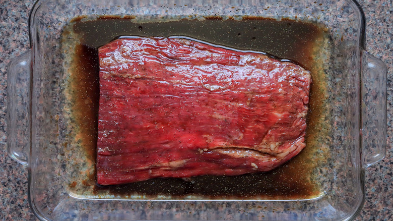 Overhead view of steak marinating 