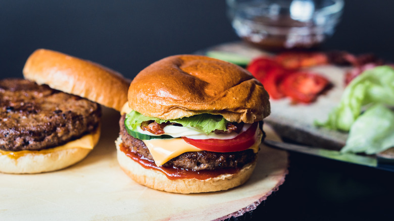 Two cheeseburgers with toppings