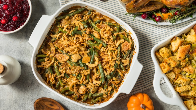 Green bean casserole on a dinner table with other dishes