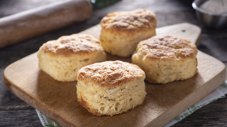 bread biscuits on wooden cutting board