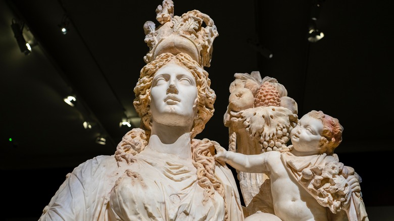 Statue of roman goddess with food