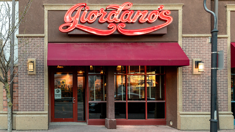 Giordano's shop front with red awning