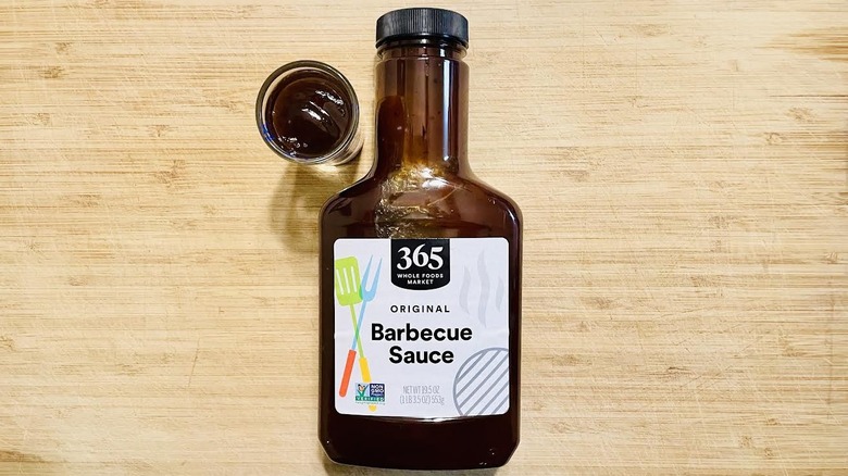 Bottle and ramekin of 365 by Whole Foods Market Barbecue Sauce