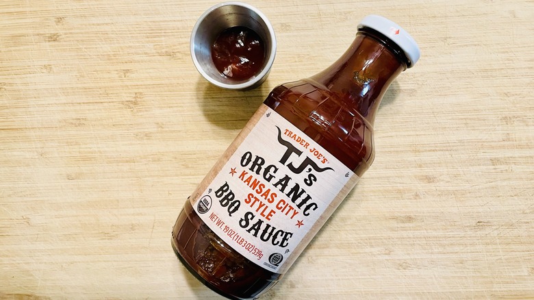 Bottle and ramekin of Trader Joe's Organic Kansas City Style BBQ Sauce