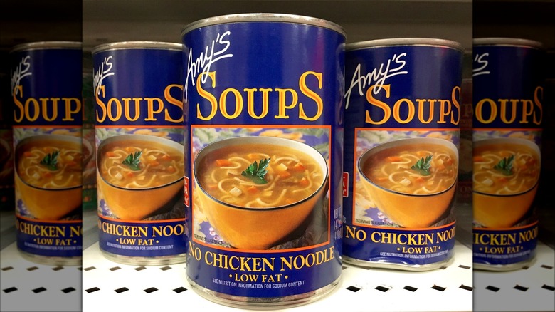 Cans of Amy's Kitchen Chicken Noodle Soup