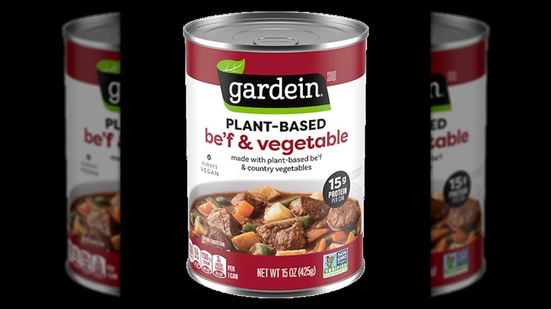 Cans of Gardein soup at the grocery store