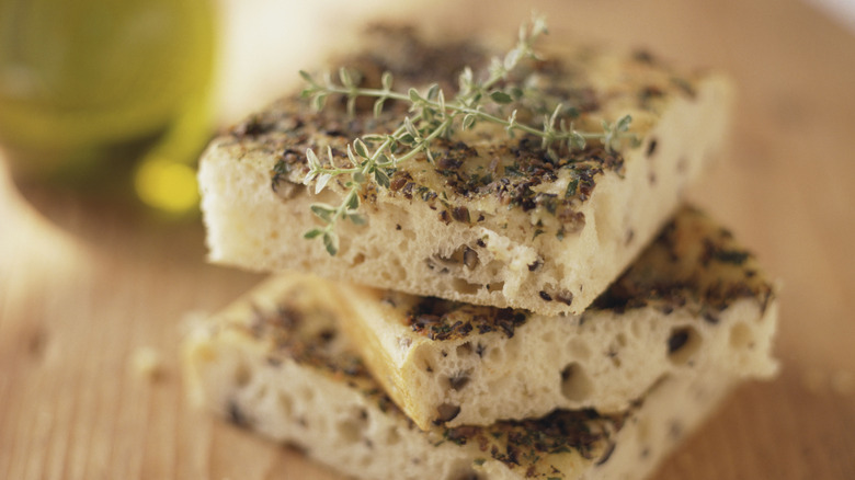 A stack of rosemary focaccia is displayed.