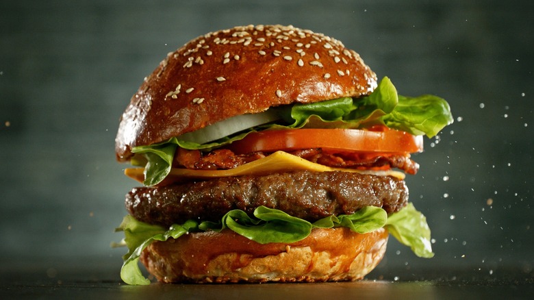juicy hamburger on sesame bun