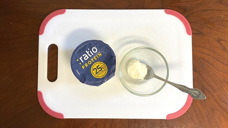 Ratio High-Protein Yogurt container sits on a table