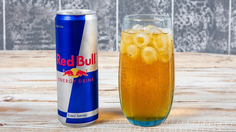 Red Bull can with glass