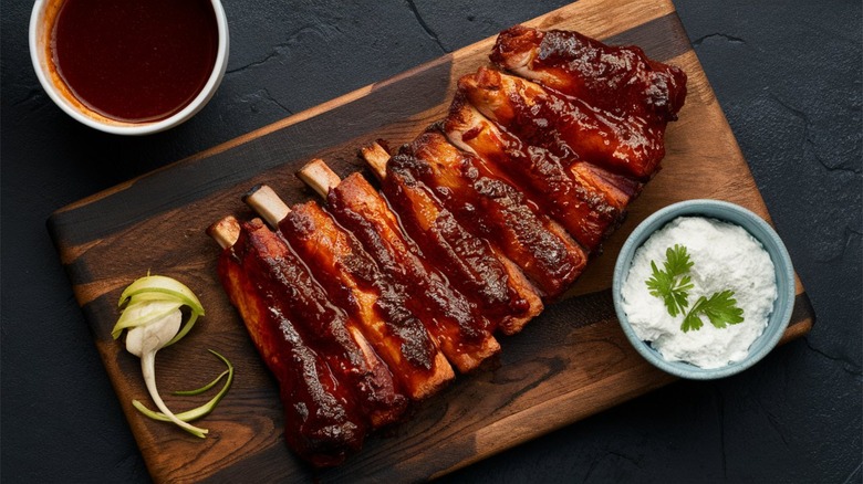 Glazed ribs on wooden board