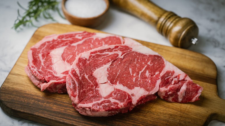 Ribeye steak on cutting board