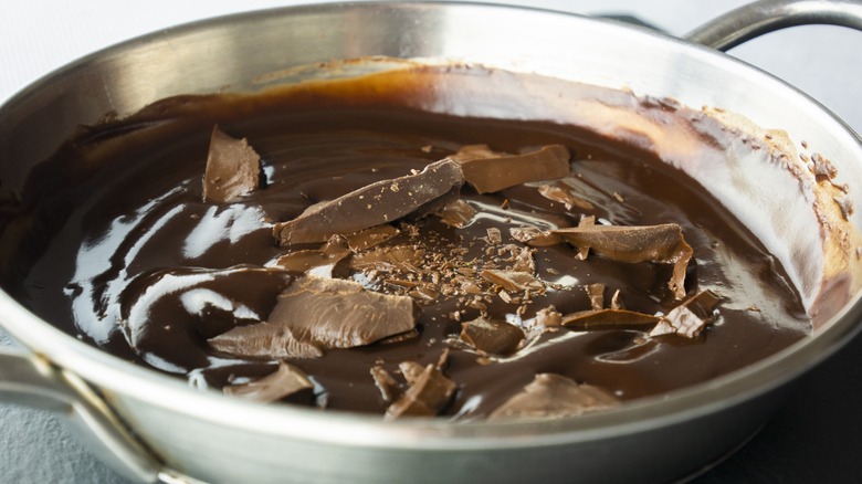 Chocolate melting, tempering in a metal bowl