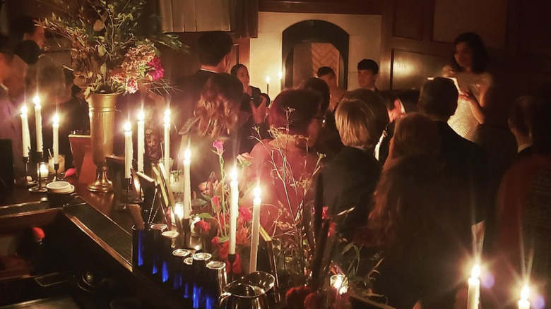 A private party with taper candles at Clover Club