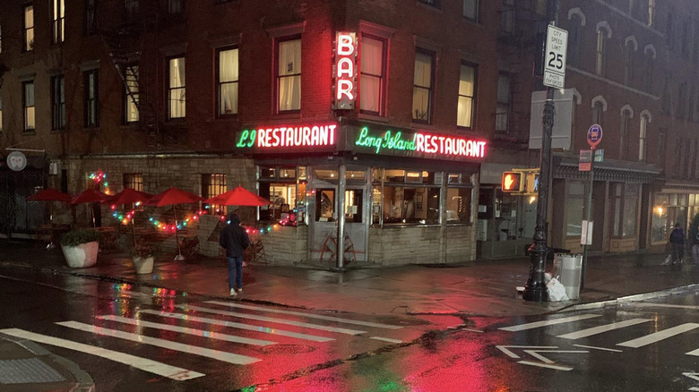 The exterior of Long Island Bar at night