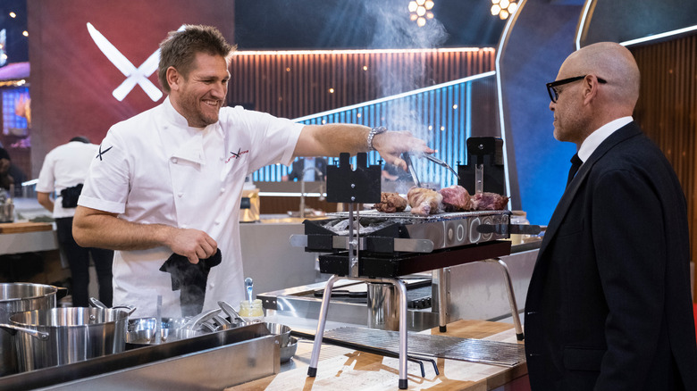 Curtis Stone and Alton Brown in "Iron Chef: Quest for an Iron Legend"