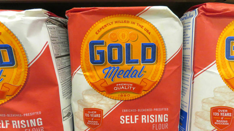 Bags of self-rising flour on the grocery store shelf