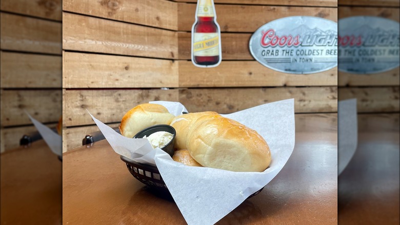 basket of rolls with butter