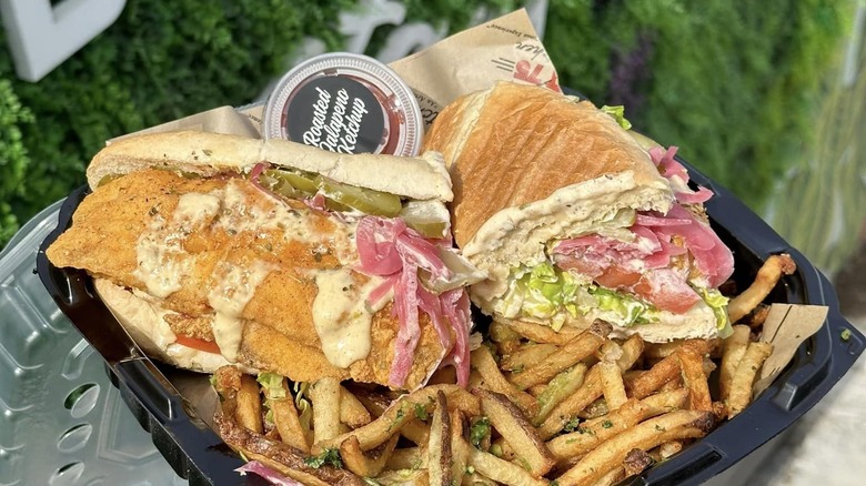 Fried fish sandwich with fries