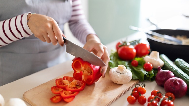 chef slicing vegetables