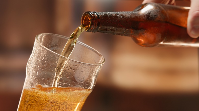 Beer being poured into glass 