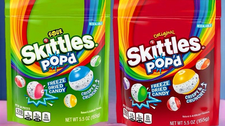 Packages of Skittles Pop'd Sour and Original flavors