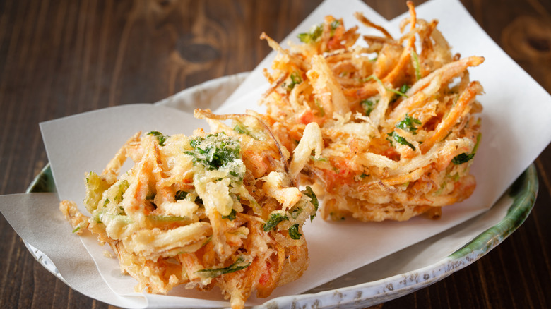 Elaborate vegetable tempura served on a plate.