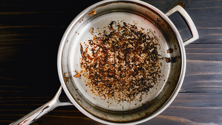 Stainless steel pan with brown bits