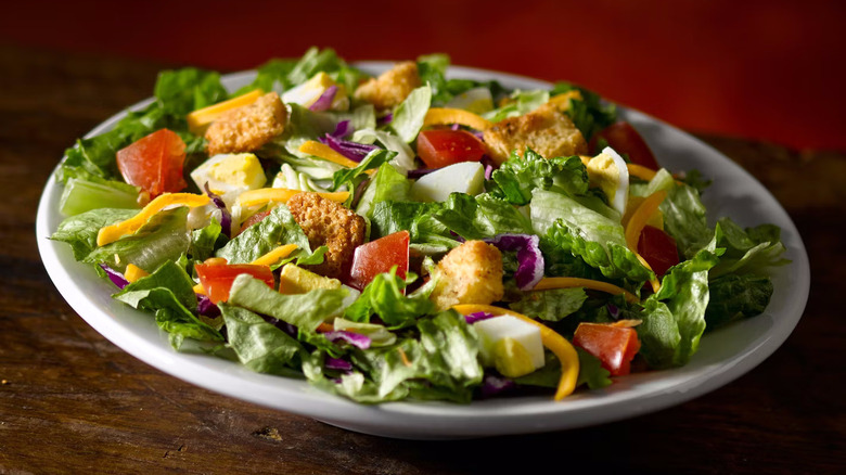 A house salad with croutons from Texas Roadhouse