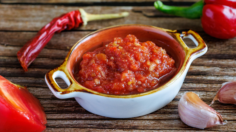 Garlic and chile pepper salsa in a bowl