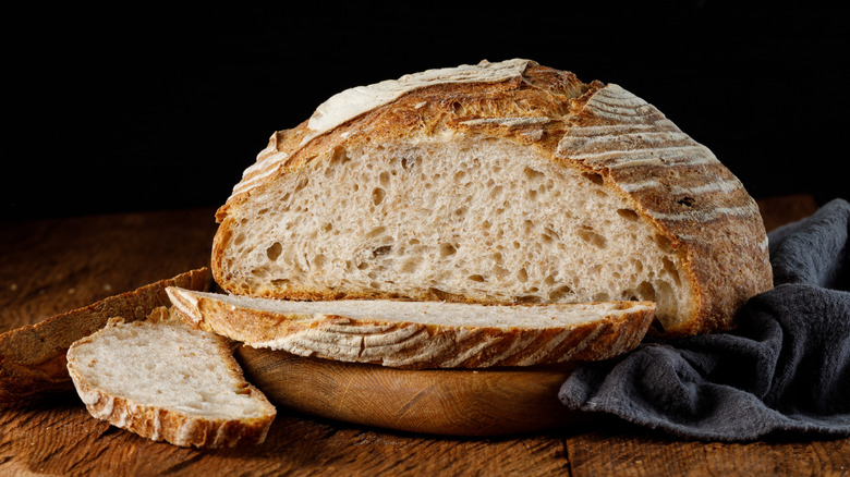 sliced sourdough bread wooden table