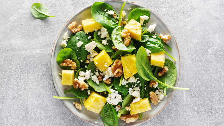 pineapple salad with spinach and cheese
