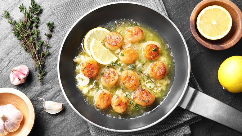 scallops cooking in pan