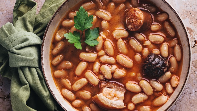 A bowl of Spanish beans with stewed meats