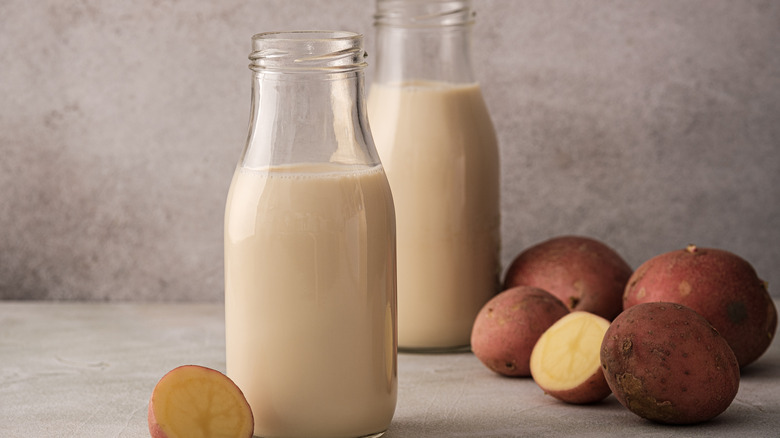 Jars of milk with potatoes