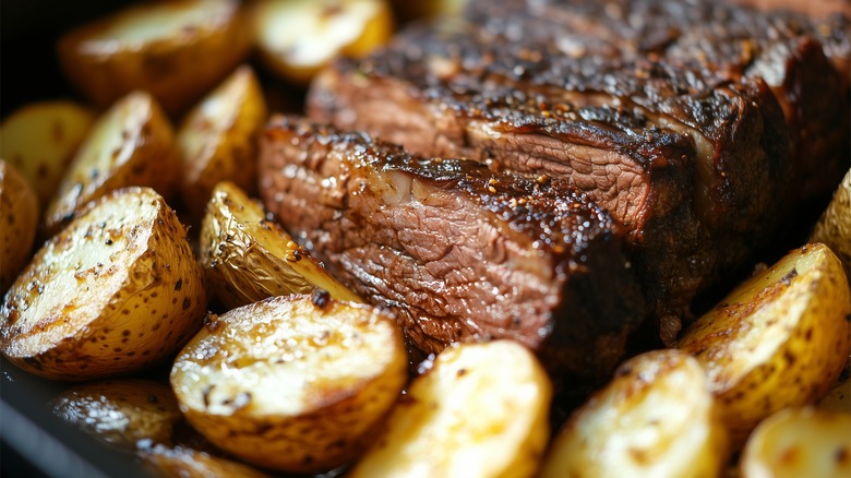 Oven roasted brisket with halved potatoes