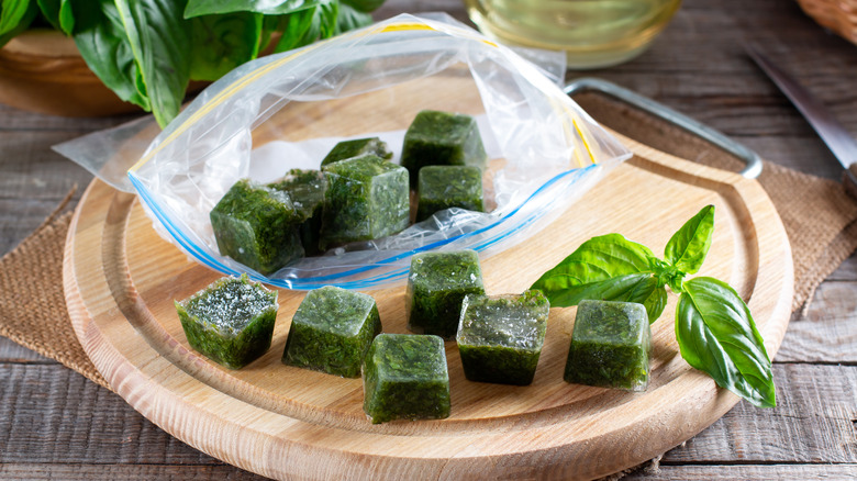 Frozen basil cubes in plastic bag