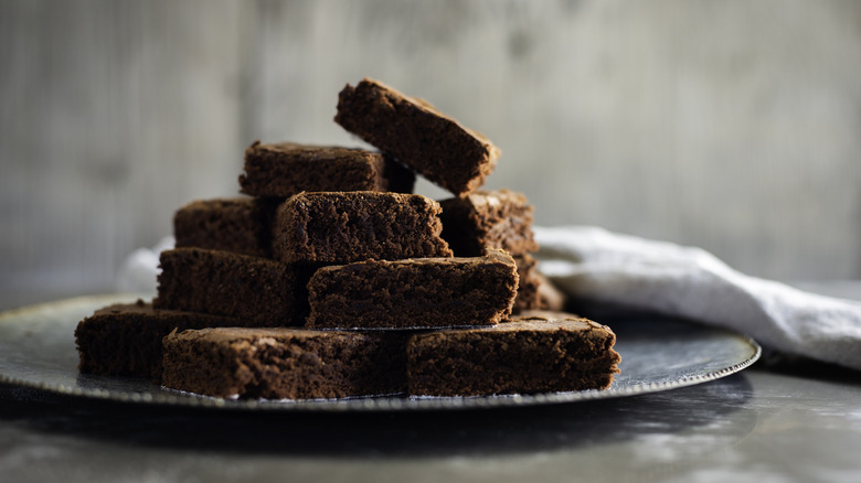 Brownies stacked on a plate