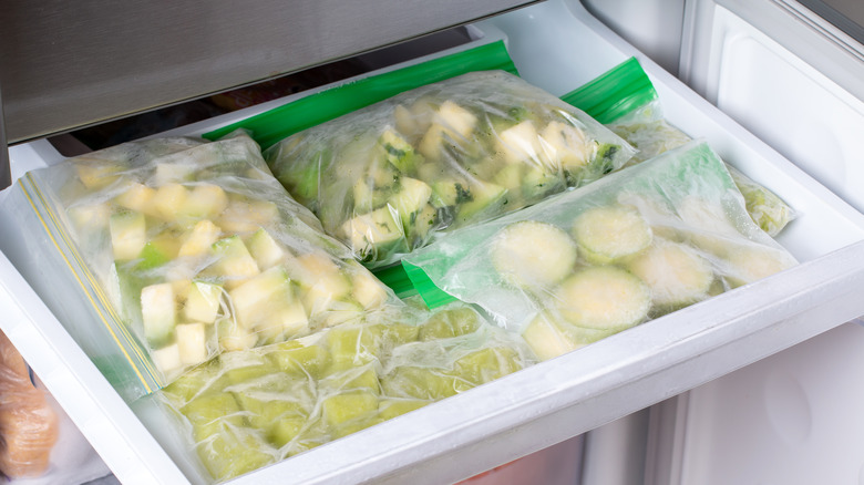 Frozen zucchini in plastic freezer bags