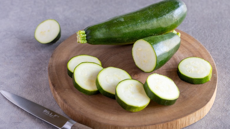 Whole and sliced zucchini