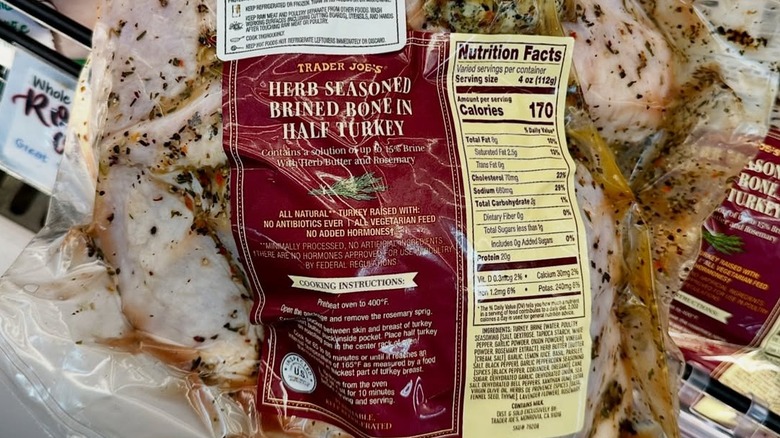 Package of Trader Joe's Herb Seasoned Brined Bone In Half Turkey