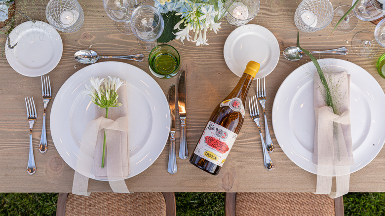 Bottle of Hey French on a dinner table