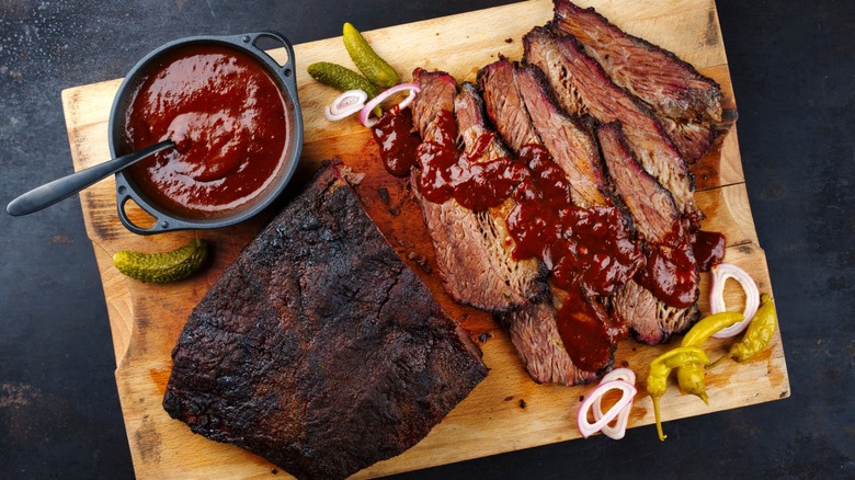 Overview of smoked brisket with sauce