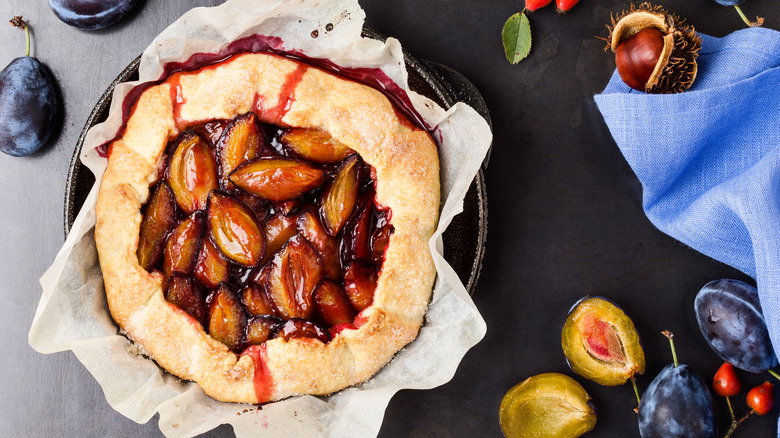 Rustic plum galette with whole fruits