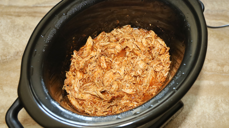 slow cooker with pulled chicken