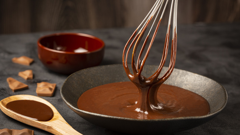 whisk and melted chocolate