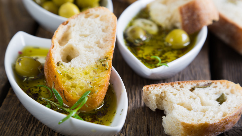 Bread dipped in olive oil