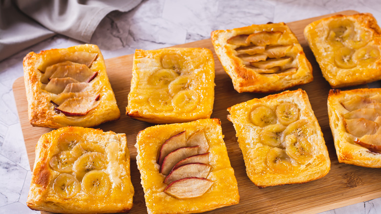 upside puff pastries on a wooden board