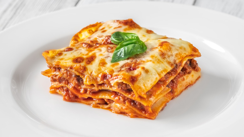 Square piece of lasagna on a plate